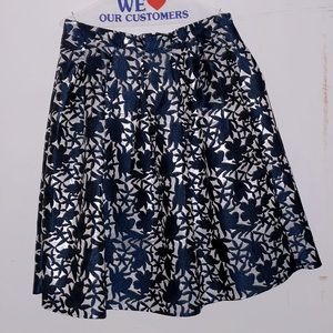 White and navy pleated skirt